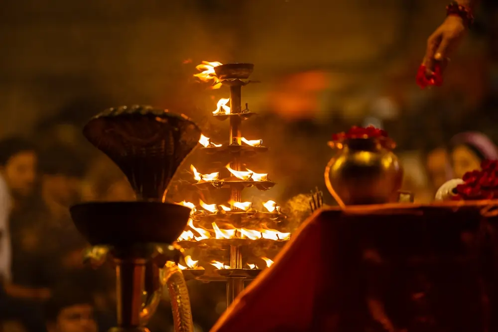 Ganga Aarti - sacred fire flames glowing at nigh